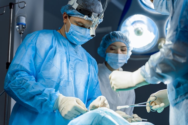 doctors performing surgery